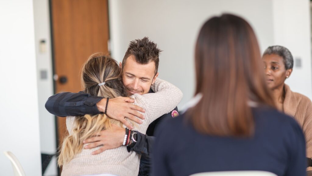 Supportive hug at drug rehab in New Jersey.