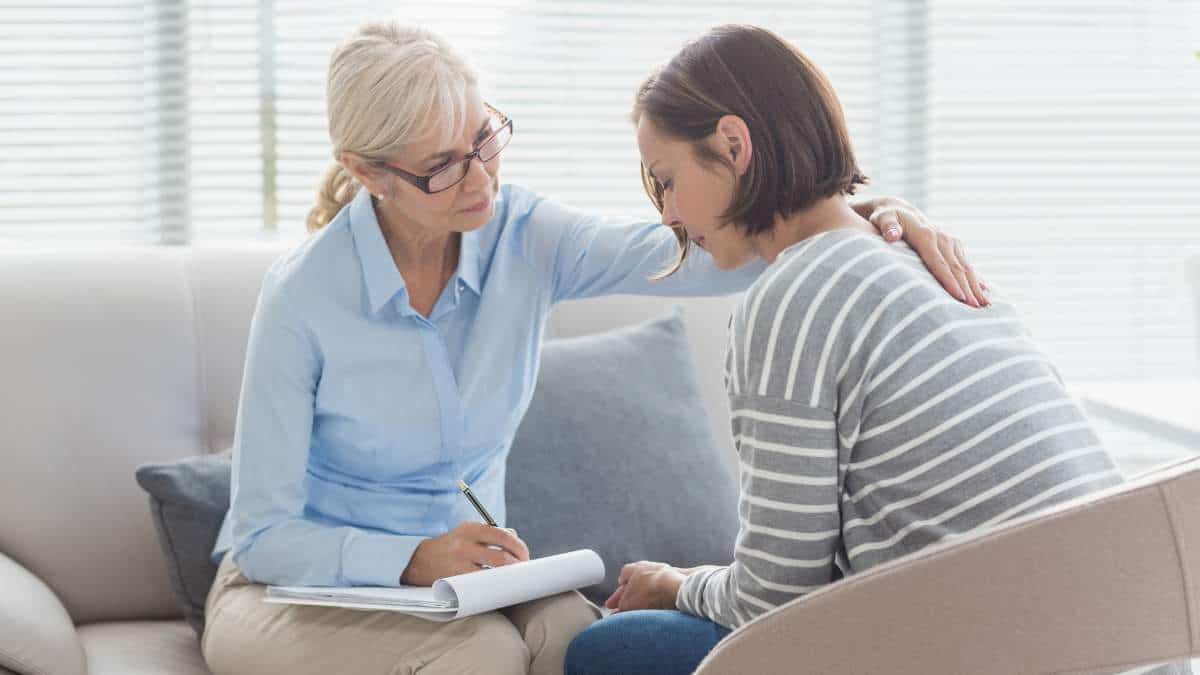 Therapist offering support to client at individual therapy during fentanyl addiction treatment in New Jersey. 