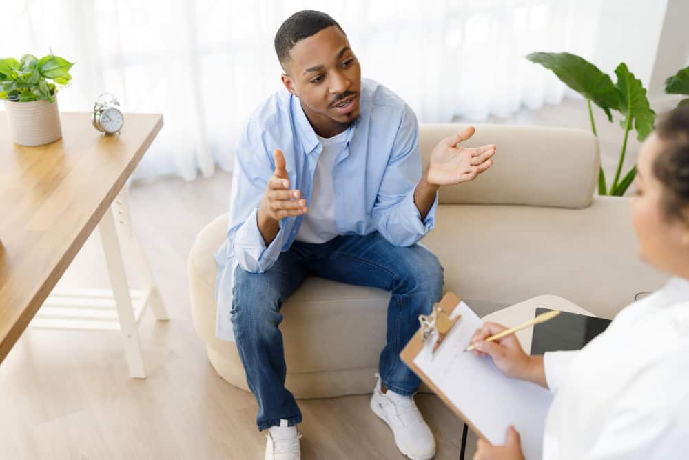 Man speaking with therapist during panic disorder treatment in New Jersey session