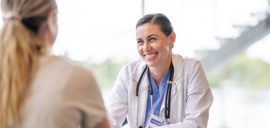 A specialist conducts an assessment at a drug rehab for healthcare professionals.