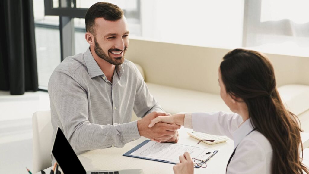 Man greets a specialist and ask ‘does the VA cover rehab services?' 