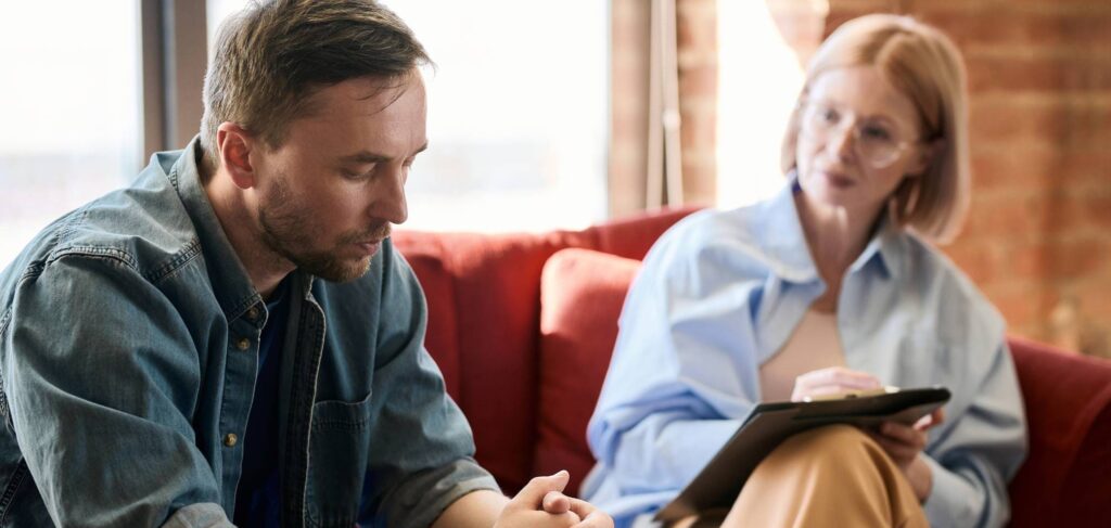 Man receiving professional support during drug addiction treatment in New Jersey.