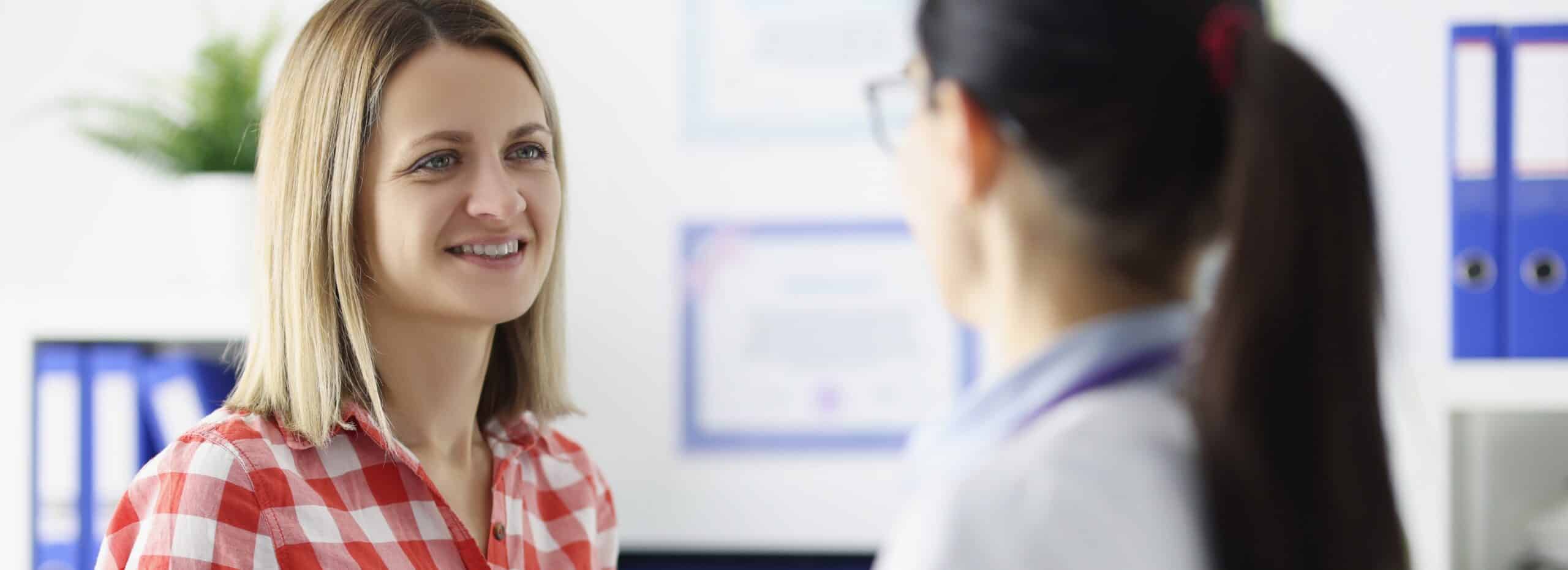 A woman discusses options for treatment with her doctor during opioid detox in New Jersey