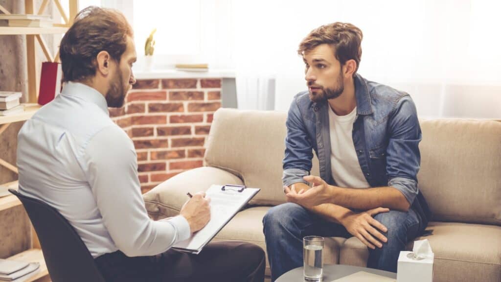 A man discusses how to move forward during a consultation for trauma treatment in New Jersey