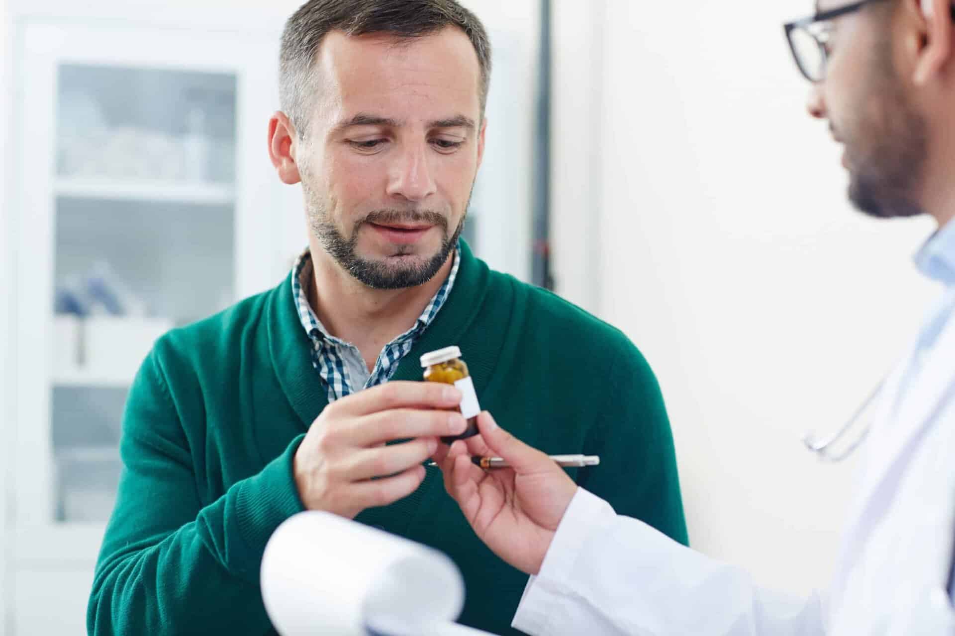 A doctor consults a client about New Jersey medication-assisted treatment.
