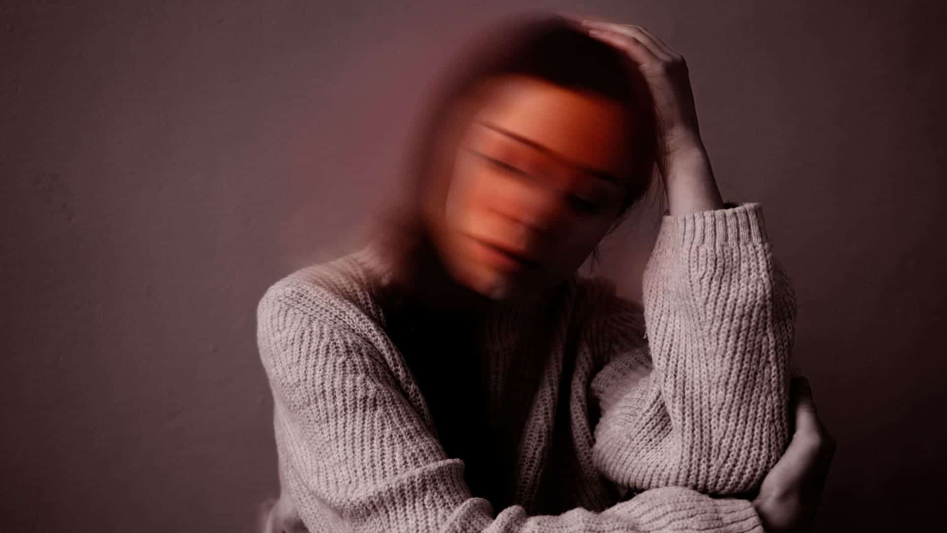 Portrait of a person suffering from symptoms of borderline personality disorder vs bipolar. 